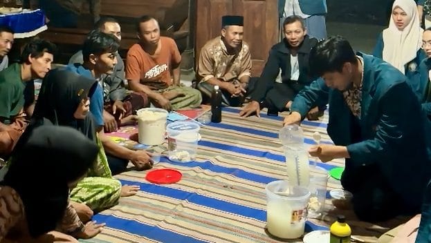 A group of people sitting around a tableAI-generated content may be incorrect.